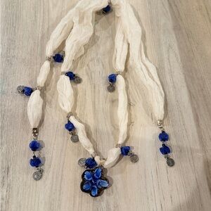 Chic Blue and White Necklace with Floral Pendant
